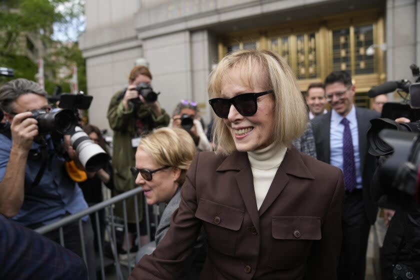 E. Jean Carroll walks out of Manhattan federal court, Tuesday, May 9, 2023, in New York. A jury has found Donald Trump liable for sexually abusing the advice columnist in 1996, awarding her $5 million in a judgment that could haunt the former president as he campaigns to regain the White House. (AP Photo/Seth Wenig)