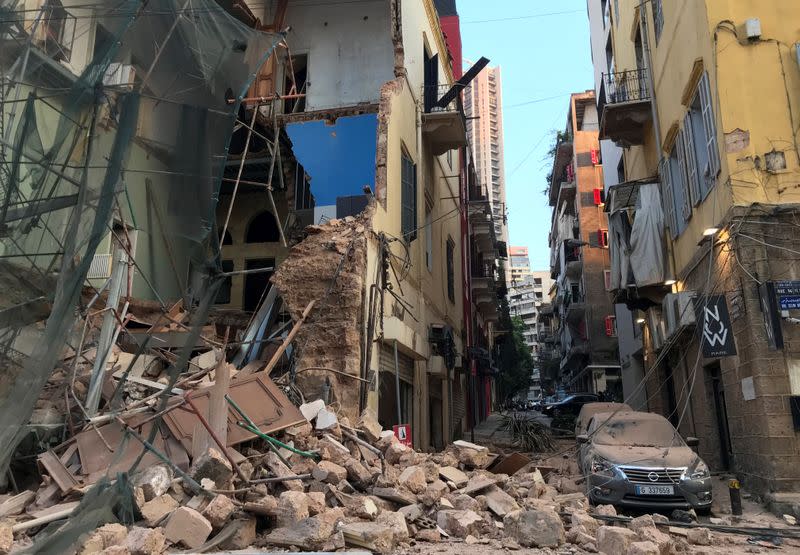 A general view shows the damage along a street following a blast in Beirut's port area