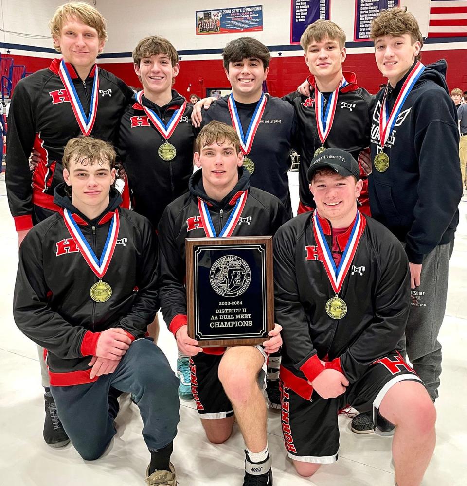 Honesdale senior wrestlers posing with the District 2 Duals Class AA championship plaque (kneeling, from left): Joey Giannetti, Joel Landry, Caleb Dodson. Standing are: Carter Kennedy, Andrew Scanlon, Julian Pons, Cole Chesna, Logan Hedgelon.