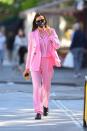 <p>The model stepped out in Manhattan wearing a pink suit and shirt from Hugo Boss to grab coffee. Shayk colour-drenched with a matching By Far handbag, and toughened up the look with Dr Martens boots. </p><p><a class="link " href="https://www.selfridges.com/GB/en/cat/by-far-cush-grained-leather-shoulder-bag_R03752724/" rel="nofollow noopener" target="_blank" data-ylk="slk:SHOP IRINA'S BAG HERE;elm:context_link;itc:0;sec:content-canvas">SHOP IRINA'S BAG HERE</a></p>