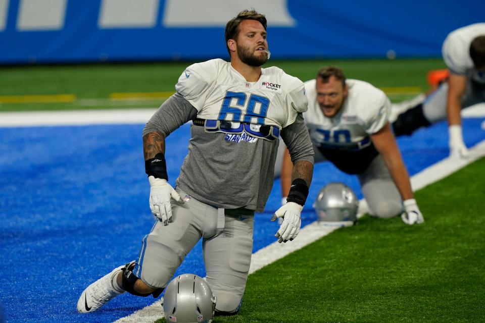 Detroit Lions left tackle Taylor Decker stretches before drills at practice Wednesday, Sept. 2, 2020 at Ford Field in Detroit.