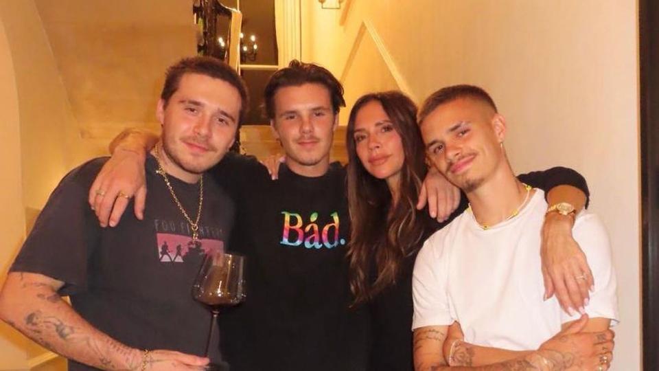 Victoria with her sons at a night in at home without husband David