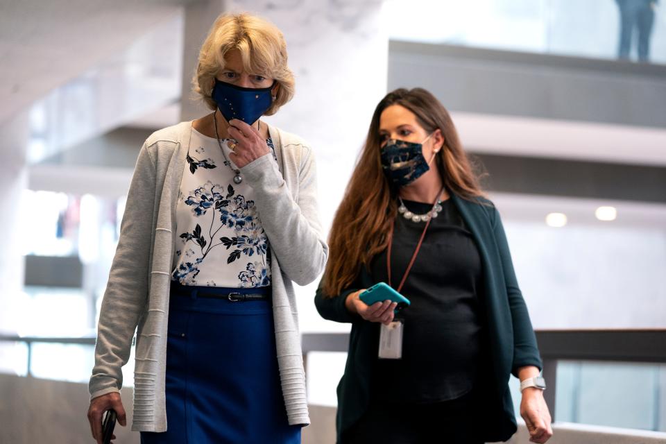 Sen. Lisa Murkowski, R-Alaska,  wears a protective mask at the weekly Senate Republican policy luncheon in the Hart Senate Office Building on Capitol Hill on Oct. 20, 2020 in Washington.