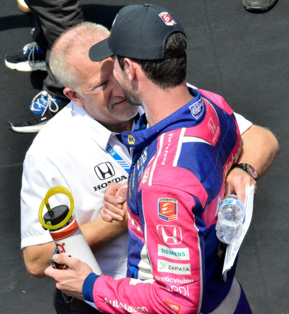 Andretti team owner Rob Edwards congratulates Andretti Autosport driver Alexander Rossi (27) Saturday, July 30, 2022, after winning the Gallagher Grand Prix at Indianapolis Motor Speedway.