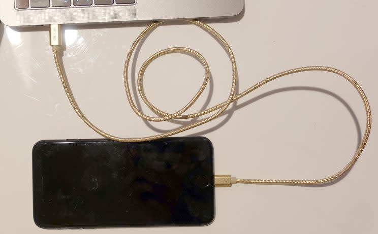 My new Lightning cable. (I chose gold so it’d show up in the depths of my laptop bag.)