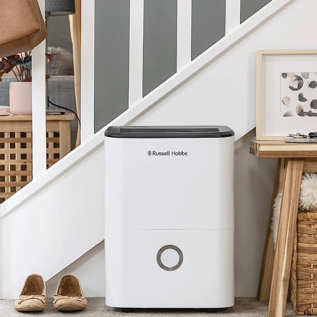  The Russell Hobbs 20 litre dehumidifier in hallway of an open plan living area. 