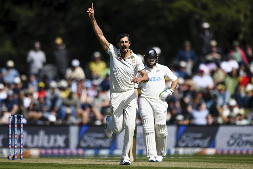 Mitchell Starc of Australia celebrates the wicket of New Zealand's Will Young on day two of the second cricket test between New Zealand and Australia in Christchurch, New Zealand, Saturday, March 9, 2024. (John Davidson/Photosport via AP)