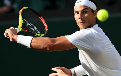 Rafael Nadal of Spain in action against Roger Federer of Switzerland during their semi final match for the Wimbledon Championships - Credit: Mike Egerton/POOL/EPA-EFE/REX