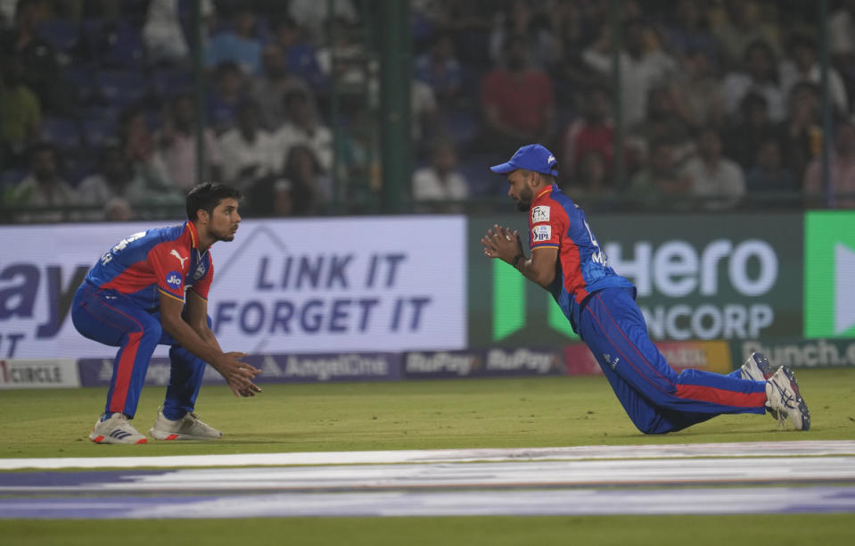 Delhi Capitals' Mukesh Kumar takes the catch of Lucknow Super Giants captain KL Rahul during the Indian Premier League cricket match between Delhi Capitals and Lucknow Super Giants in New Delhi, India, Tuesday, May 14, 2024.(AP Photo/Manish Swarup)