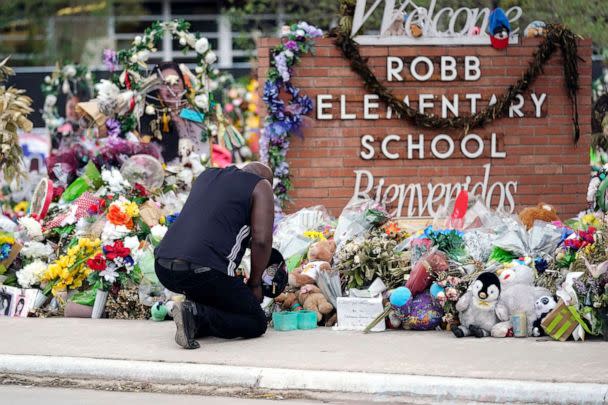 PHOTO: A person pays respects at a memorial at Robb Elementary School on June 9, 2022, in Uvalde, Texas. (Eric Gay/AP, FILE)