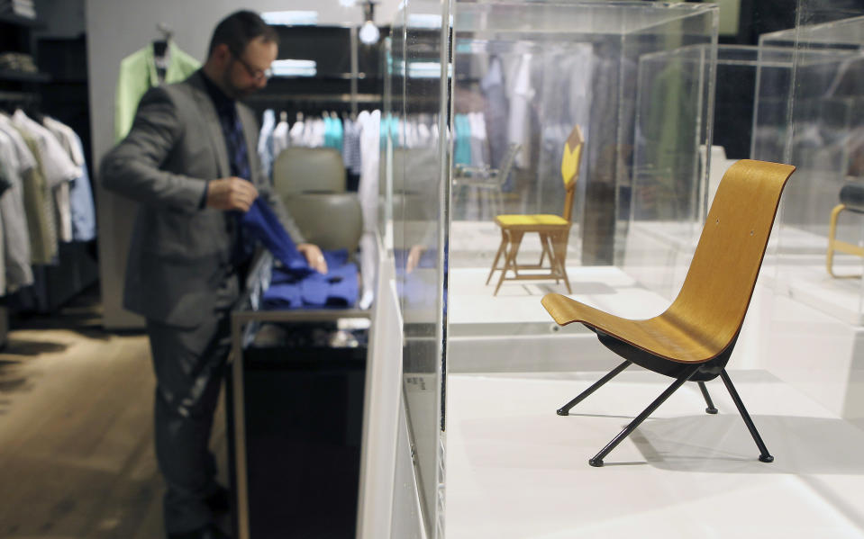 In this Friday, April 20, 2012 photo Models classic chairs are seen during Milan's Furnishing Accessories Exhibition, in Milan, Italy. The Milan Furniture Fair, a six-day event which ended Sunday, was full of experiment and whimsy. (AP Photo/Antonio Calanni)