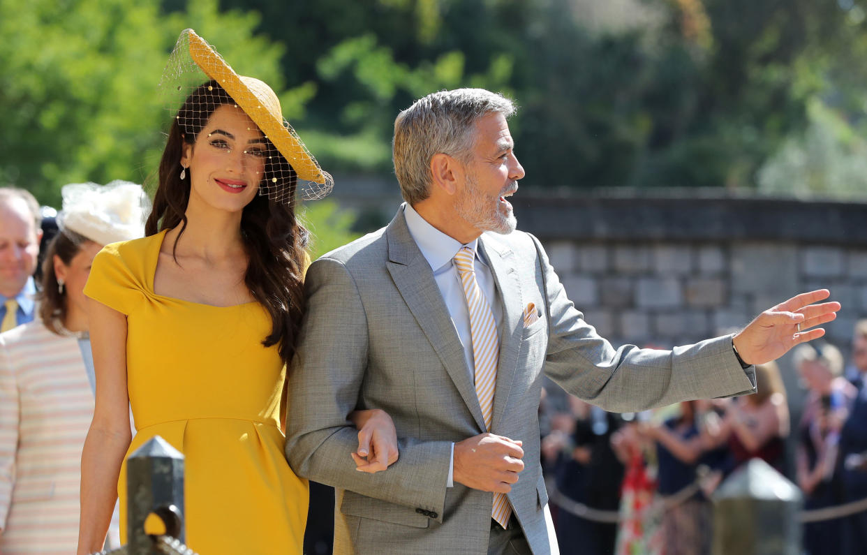 There’s rumours Amal and George Clooney may be attending their second royal wedding due to a business partnership [Photo: Getty]