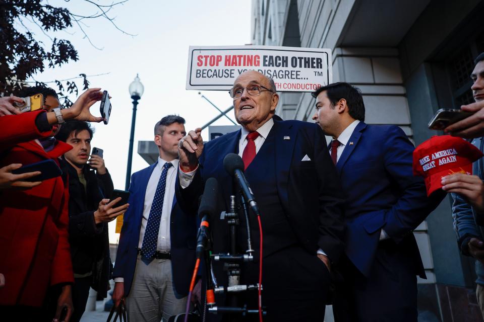 Rudy Giuliani, the former personal lawyer for former President Donald Trump, speaks with reporters outside of the E. Barrett Prettyman U.S. District Courthouse after a verdict was reached in his defamation jury trial on Dec. 15, 2023 in Washington, DC. A jury has ordered Giuliani to pay $148 million in damages to Fulton County election workers Ruby Freeman and Shaye Moss.