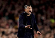 Porto manager Sergio Conceicao gestures on the touchline during the Champions League round of 16, second leg soccer match between Arsenal and Porto at the Emirates Stadium, London, Tuesday March 12, 2024. (Zac Goodwin/PA via AP)