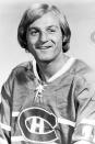 FILE -Montreal Canadiens' Guy Lafleur is pictured in 1974. Hockey Hall of Famer Guy Lafleur, who helped the Montreal Canadiens win five Stanley Cup titles in the 1970s, died Friday, April 22, 2022, at age 70. (AP Photo/File)