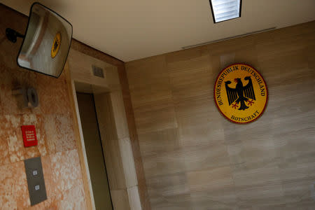 The coat of arms of Germany is seen outside Germany's embassy in Caracas, Venezuela March 6, 2019. REUTERS/Carlos Garcia Rawlins