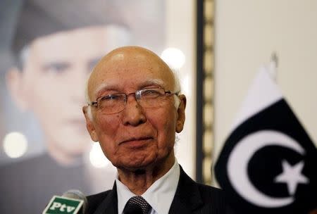 Sartaj Aziz listens to a question during a news conference with Iranian Foreign Minister Javad Zarif at the Foreign Ministry in Islamabad April 8, 2015. REUTERS/Caren Firouz