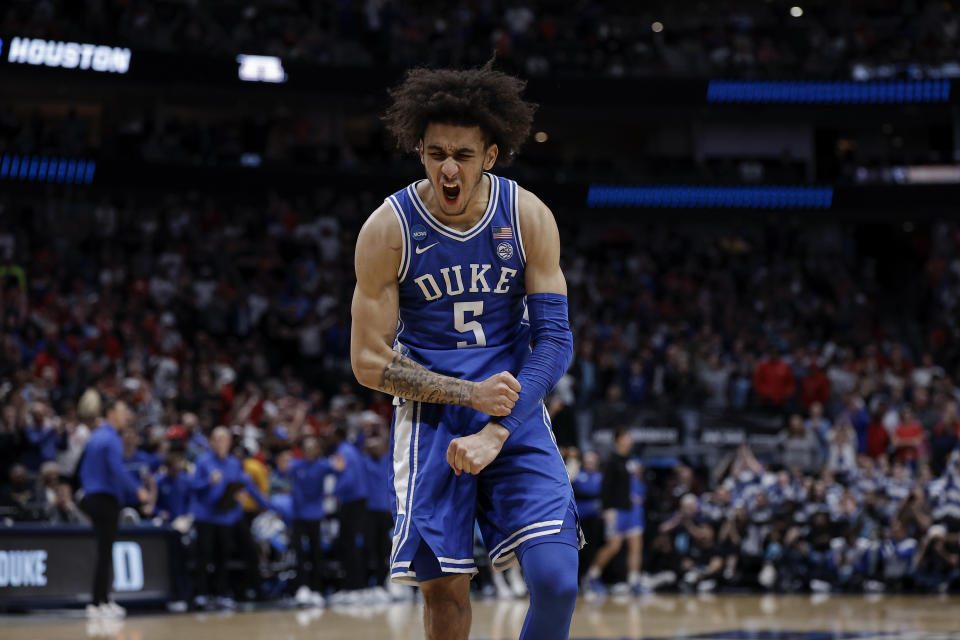 Duke’s Tyrese Proctor reacts during the second half of a Sweet 16 college basketball game against Houston in the NCAA Tournament in Dallas, Friday, March 29, 2024. Duke won 54-51. (AP Photo/Brandon Wade)