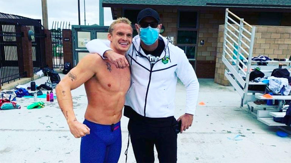 Cody Simpson is pictured here with his swim coach Brett Hawke.