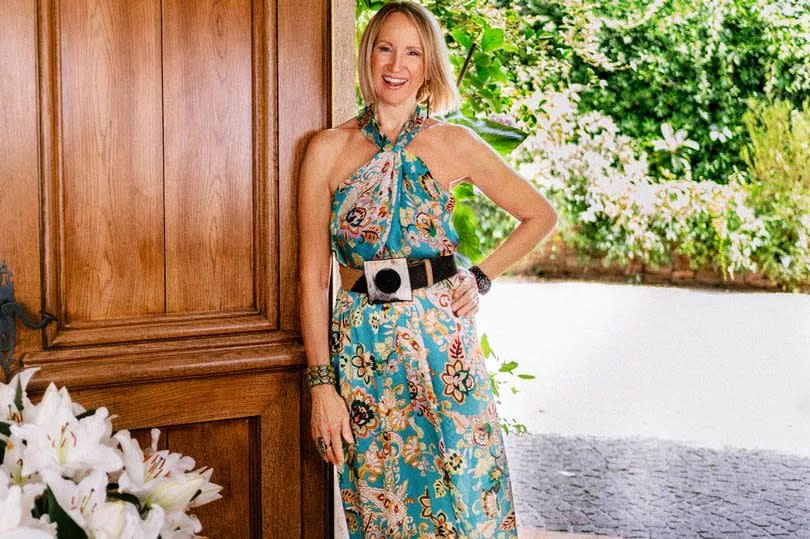 Carol McGiffin stands in a doorway