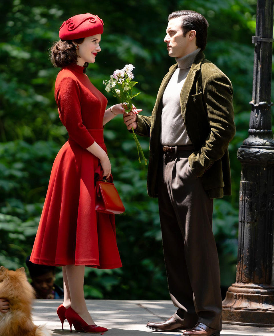 <p>While we don't know the exact details of Ventimiglia's character, it certainly <em>looks</em> like things are about to get little romantic! In one photo, the actor hands Brosnahan a bouquet of flowers. </p>