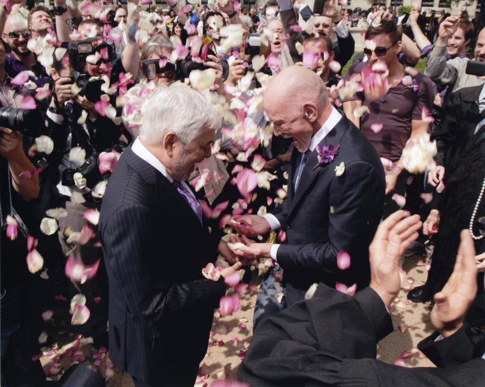 Jose “Pepe” Pena, left, and Arthur Johnston finally get married. Major proponents of gay rights, the two fell in love at age 29 and have been together ever since.