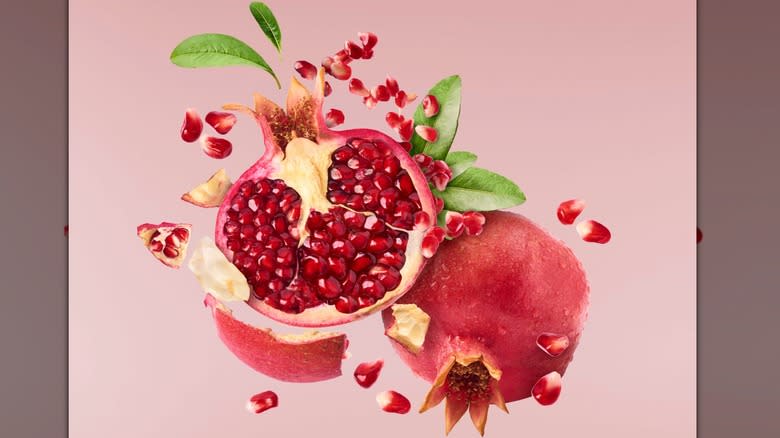 pomegranate on pink background