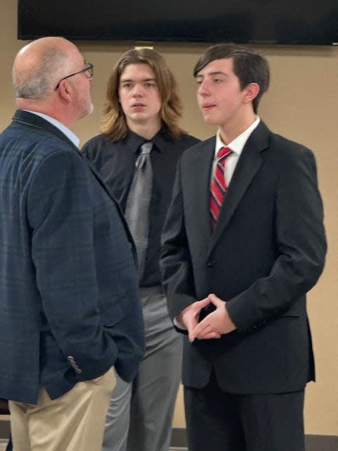 Senator Joseph Bellino Jr. (left) is shown with Airport High School Youth in Government students Joshua Hanning and Nicholas Brannan at an event at the South Rockwood Branch Library.