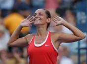 Roberta Vinci of Italy celebrates with the crowd after defeating Serena Williams of the U.S. in their women's singles semi-final match at the U.S. Open Championships tennis tournament in New York, September 11, 2015. REUTERS/Mike Segar Picture Supplied by Action Images