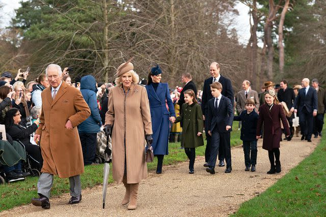 <p>Joe Giddens/PA Images/Getty</p> King Charles and Queen Camilala lead the walk to Christmas Day morning church service at St Mary Magdalene Church in Sandringham, Norfolk on Dec. 25, 2023.