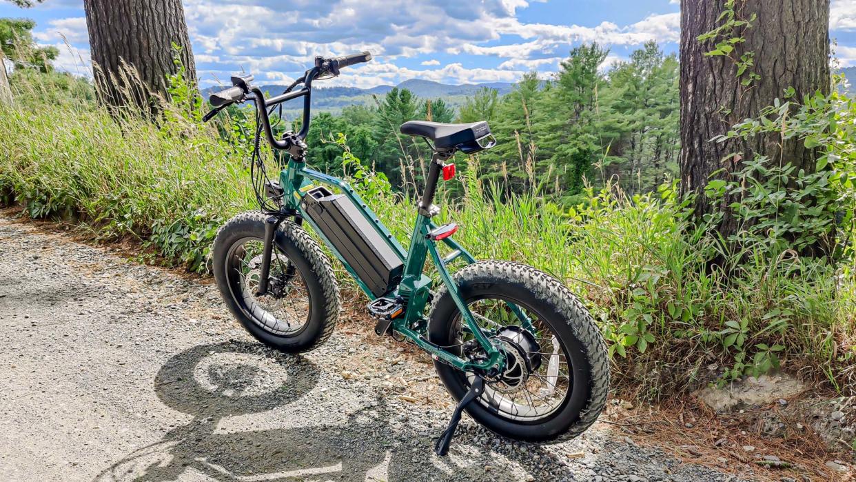  Juiced RipRacer parked on mountain trail. 