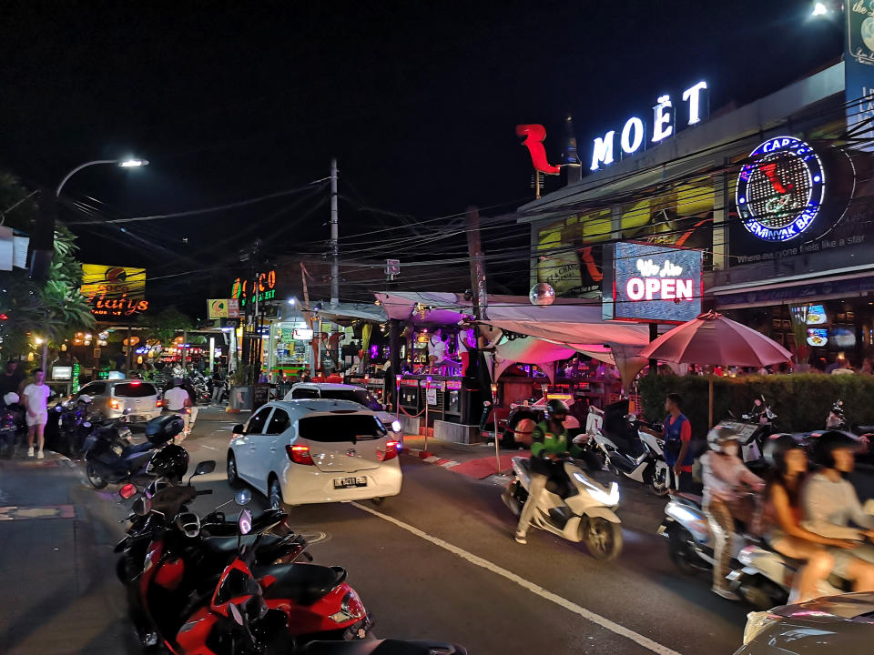 Crowded street by night in Seminyak