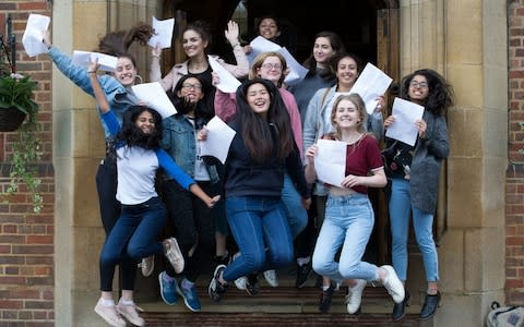 Students celebrate their A-Level results from the King Edward VI High School for Girls in Edgbaston - Credit: Aaron Chown/PA