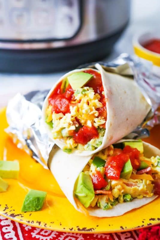 <p>Pip and Ebby</p><p>Add whatever veggies you like to the egg mixture to make these completely customizable.</p><p><strong>Get The Recipe: <a href="https://pipandebby.com/pip-ebby/instant-pot-breakfast-burritos/" rel="nofollow noopener" target="_blank" data-ylk="slk:Instant Pot Breakfast Burritos;elm:context_link;itc:0;sec:content-canvas" class="link ">Instant Pot Breakfast Burritos</a></strong></p>