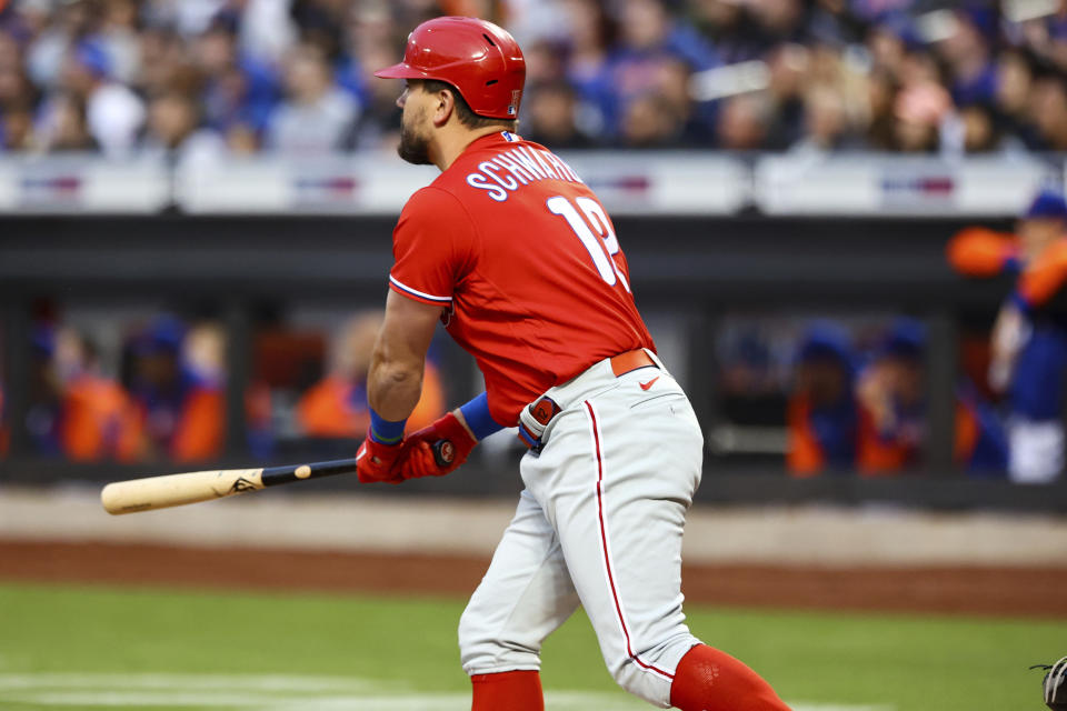 Philadelphia Phillies designated hitter Kyle Schwarber watches his home run against the New York Mets during the second inning of a baseball game, Sunday, May 1, 2022, in New York. (AP Photo/Jessie Alcheh)