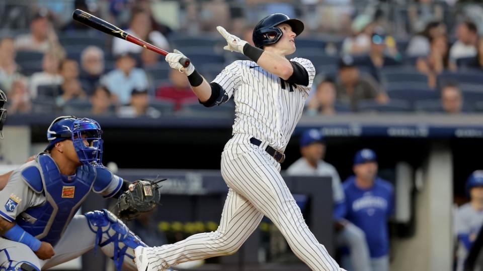 July 21, 2023;  Bronx, New York, USA;  New York Yankees center fielder Billy McKinney (57) drives home a three-run homer against the Kansas City Royals in the fourth inning at Yankee Stadium.