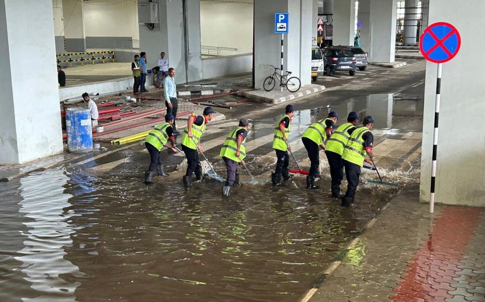 The collapse was caused by a heavy downpour which also flooded the departure drop-off area