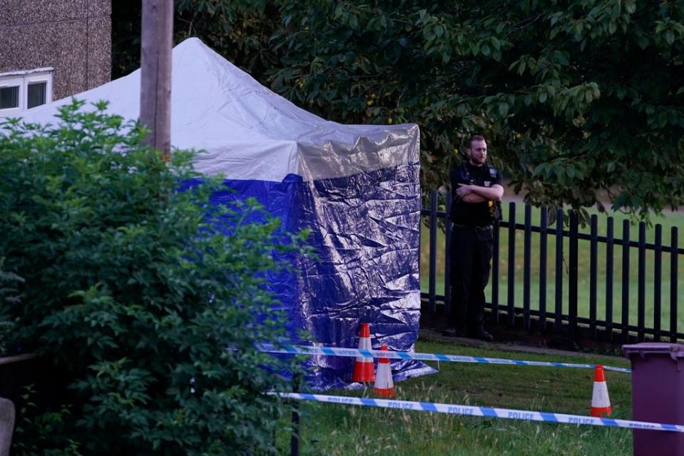 A police tent at the scene in Chandos Crescent in Killamarsh (PA)