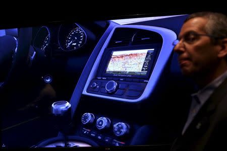 Nvidia's public relations officer Danny Shapiro speaks near an electronic dashboard at at graphic display of an Audi automobile in Santa Clara, California in this February 11, 2015 file photo. REUTERS/Robert Galbraith