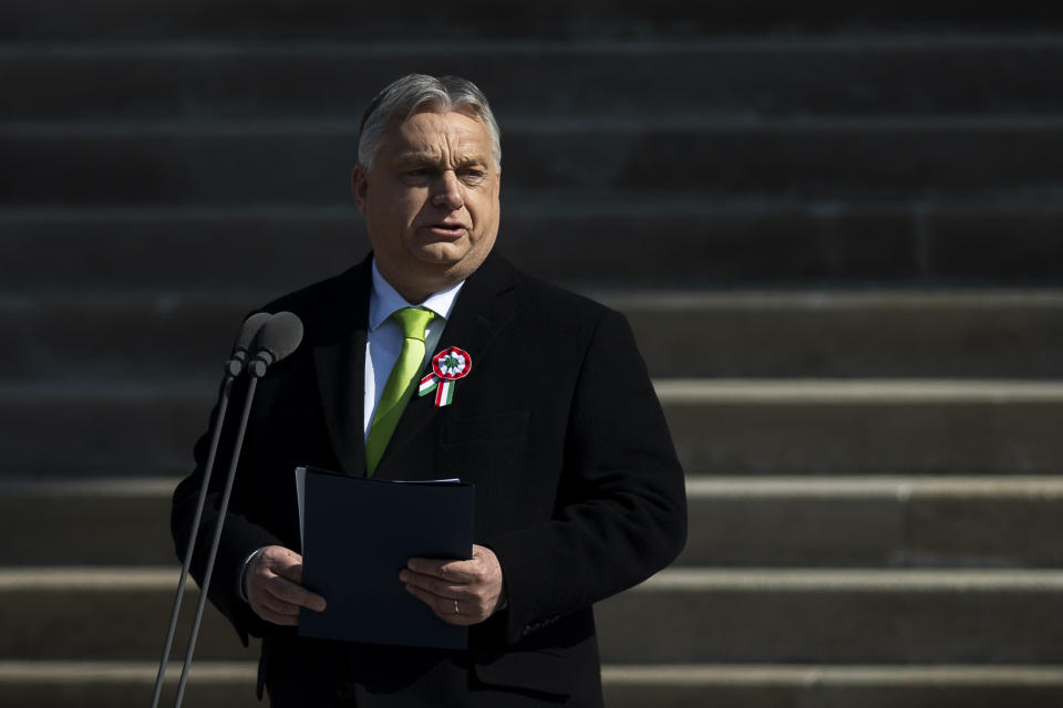 Hungarian Prime Minister Viktor Orban gives a speech on the steps of the National Museum in Budapest, Hungary, on Friday, March 15, 2024. Orban's speech, commemorating the 176th anniversary of Hungary's failed uprising against Habsburg rule, came as his government seeks to mitigate political damage from the resignation of its former president who stepped down in February over a pardon scandal. (AP Photo/Denes Erdos)