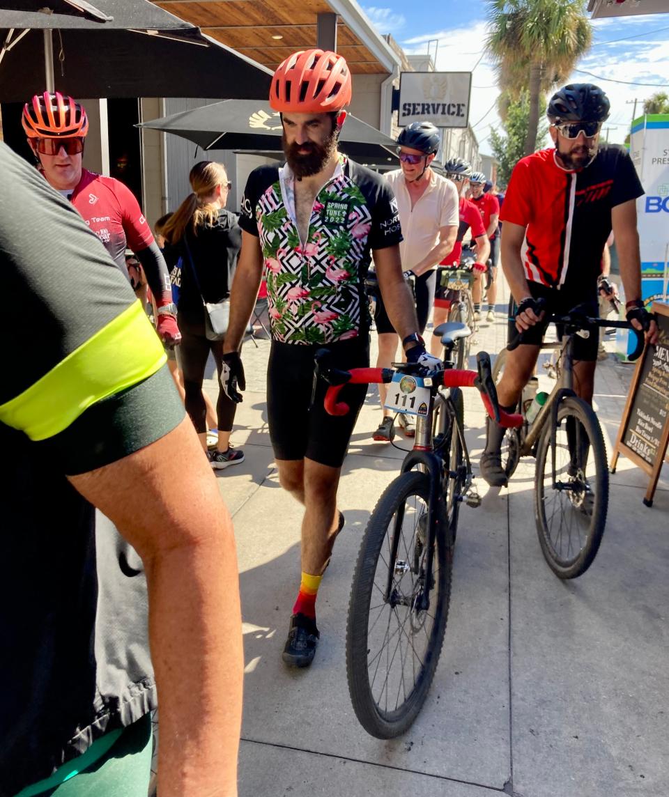 Brandon Stewart (center) from Decatur did the road route the first day and finished the last two days on the gravel route. Stewart preferred the gravel route because "it lends itself to more socializing, you go a little slower, and that's nice."