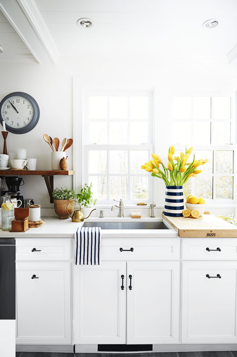 white kitchen with wood accents