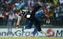 KANDY, SRI LANKA - SEPTEMBER 27: Nathan McCullum of New Zealand collides with Tillakaratne Dilshan of Sri Lanka during the ICC World Twenty20 2012 Super Eights Group 1 match between Sri Lanka and New Zealand at Pallekele Cricket Stadium on September 27, 2012 in Kandy, Sri Lanka. (Photo by Gareth Copley/Getty Images)