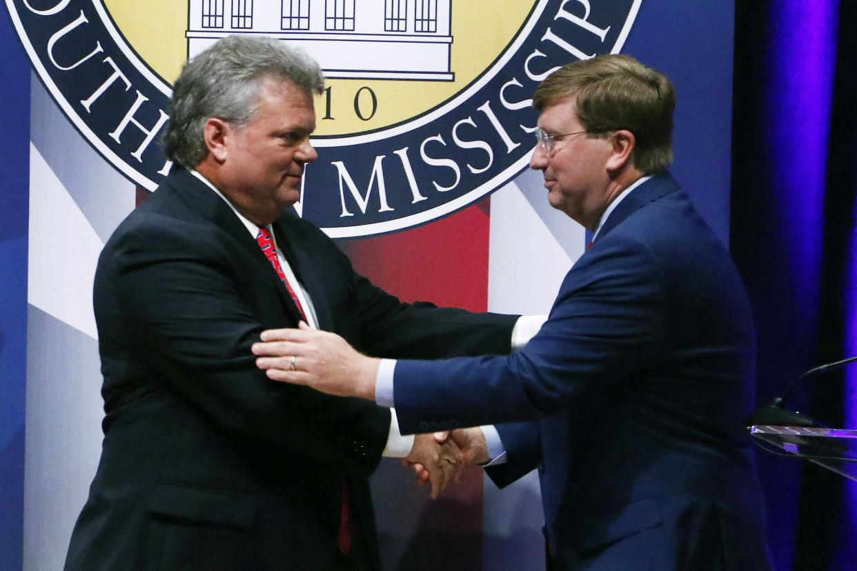 Democratic Mississippi Attorney General Jim Hood, left, and Republican Lt. Gov. Tate Reeves, right, shake hands at the conclusion of their first televised gubernatorial debate at the University of Southern Mississippi on Oct. 10, 2019.&nbsp; (Photo: AP Photo/Rogelio V. Solis)