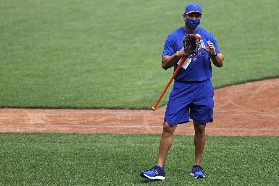 New York Mets manager Luis Rojas speaks during a baseball workout at Citi Field in New York, Friday, July 3, 2020. (AP Photo/Adam Hunger)