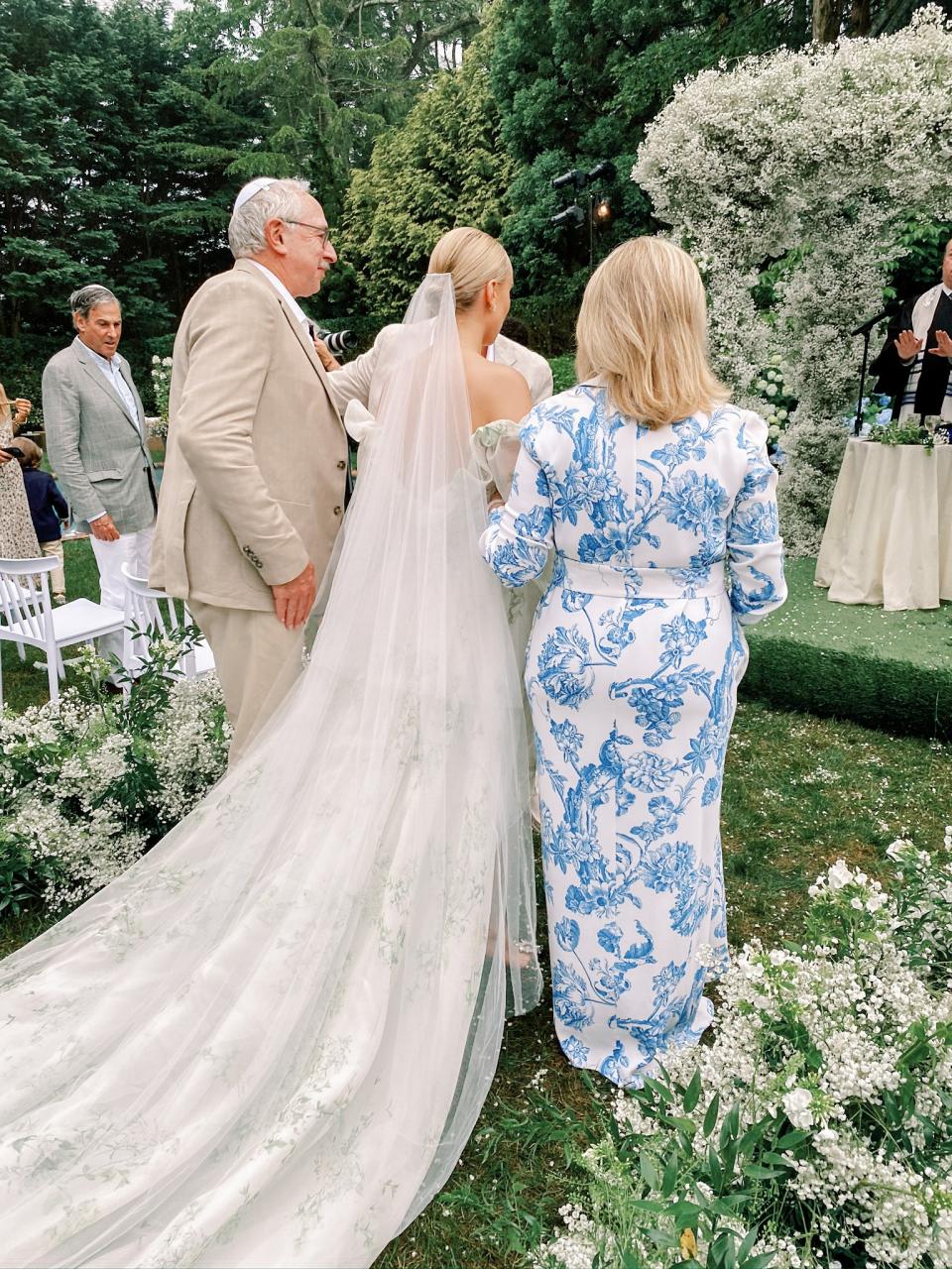 The Bride and Groom Said Their Vows Beneath a Floral Chuppah at This Hamptons Backyard Wedding