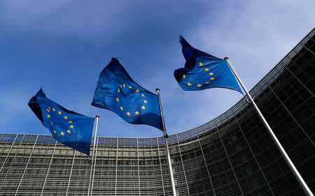 FILE PHOTO: European Union flags flutter outside the EU Commission headquarters in Brussels, Belgium, March 12, 2018. REUTERS/Yves Herman/File Photo