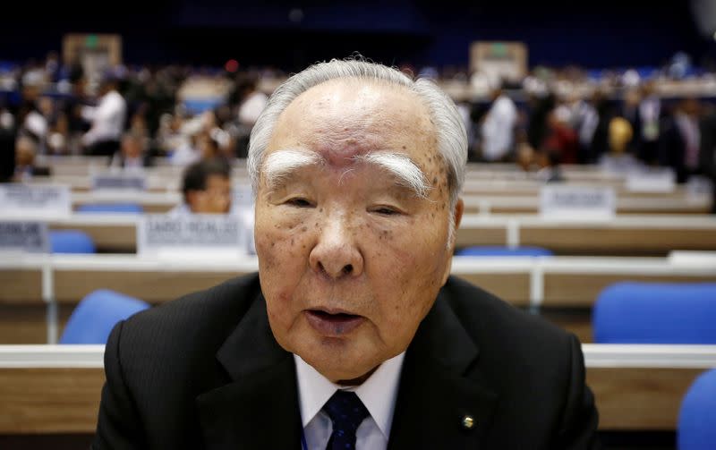 FILE PHOTO: Suzuki Motor Chairman Osamu Suzuki attends the Global Mobility Summit in New Delhi