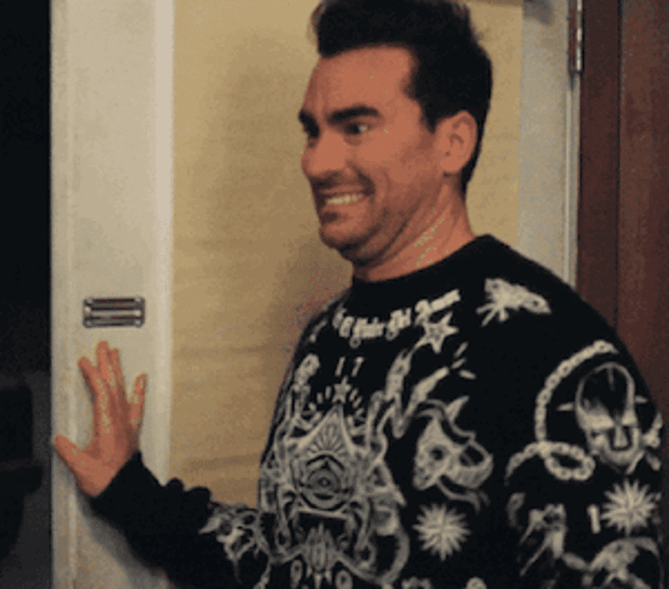 David from "Schitt's Creek" awkwardly closing a door