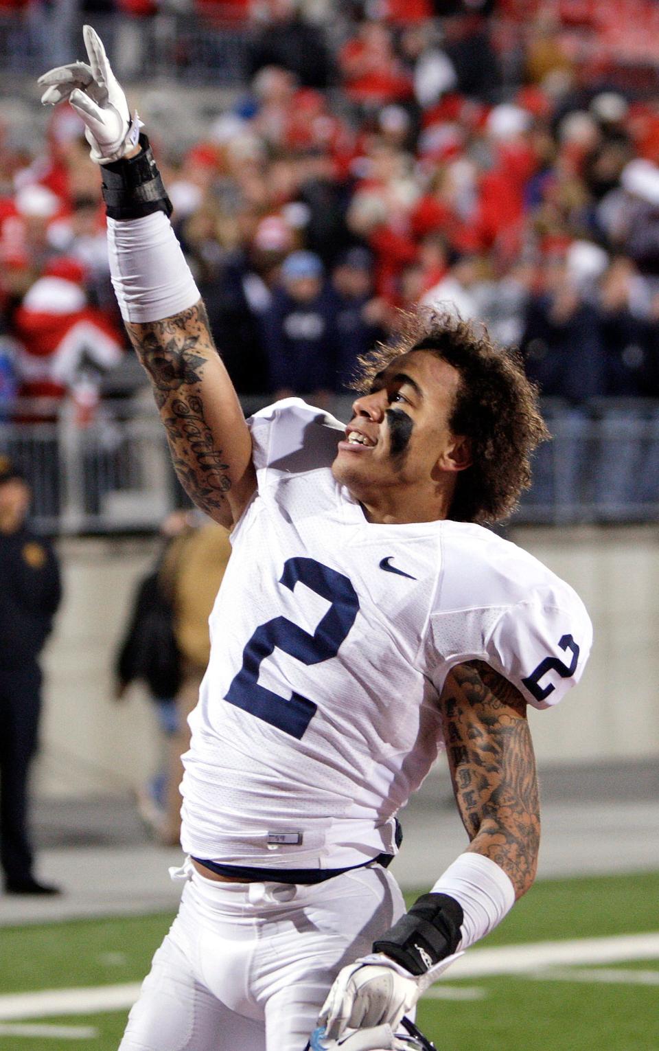 Chaz Powell celebrates after winning at Ohio State in November of 2011. One of Penn State's most versatile players ever, he hopes to pass on lessons learned now as an assistant coach at York High.